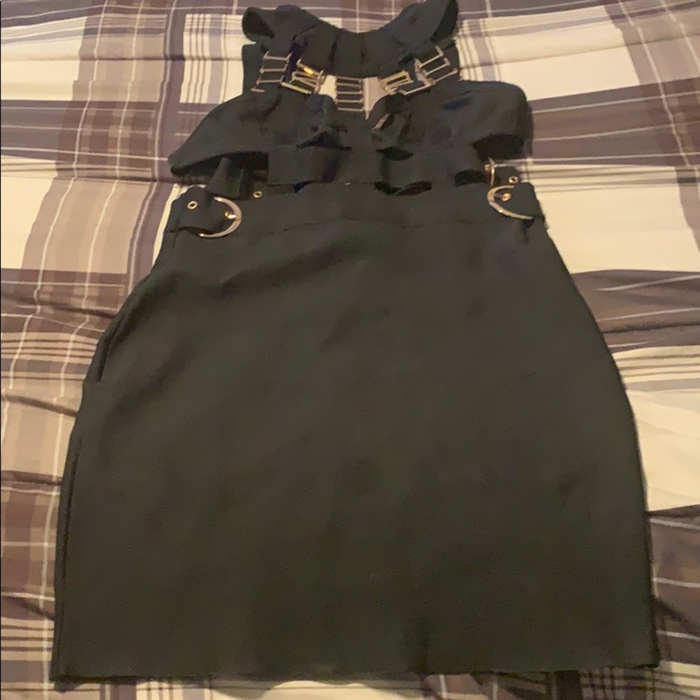 Black dress with gold buckles